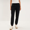 Pantalon de jogging molletonn&eacute; noir femme