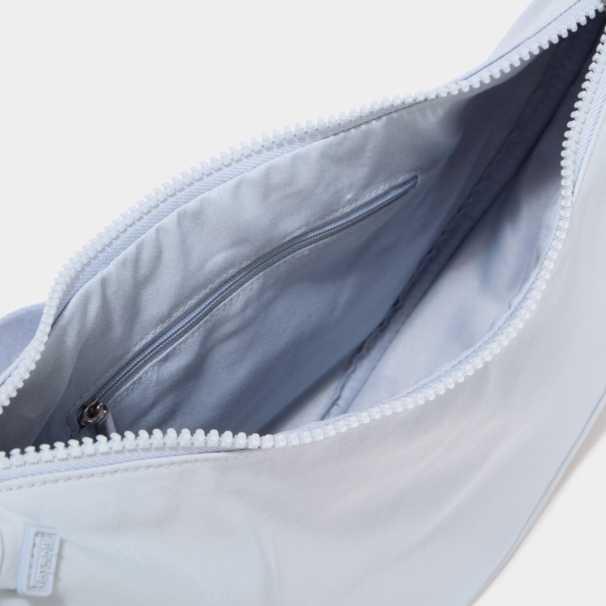Sac banane en bandouli&egrave;re bleu ciel femme