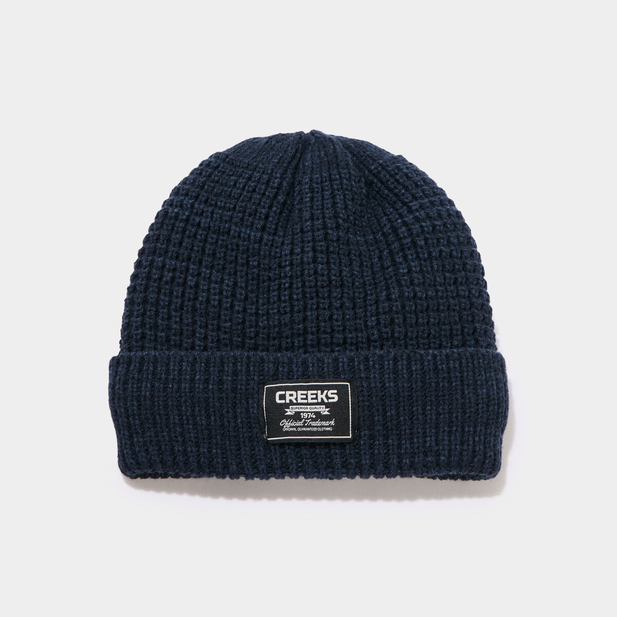 Bonnet tricot&eacute; bleu marine gar&ccedil;on