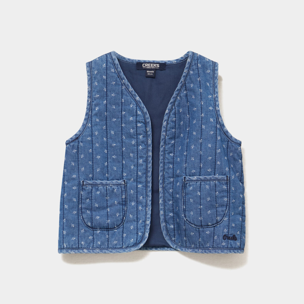 Gilet sans manches matelass&eacute; en jean denim stone b&eacute;b&eacute; fille