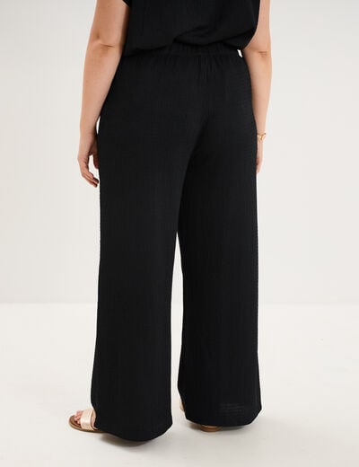 Pantalon effet gaufr&eacute; fluide noir femme grande taille
