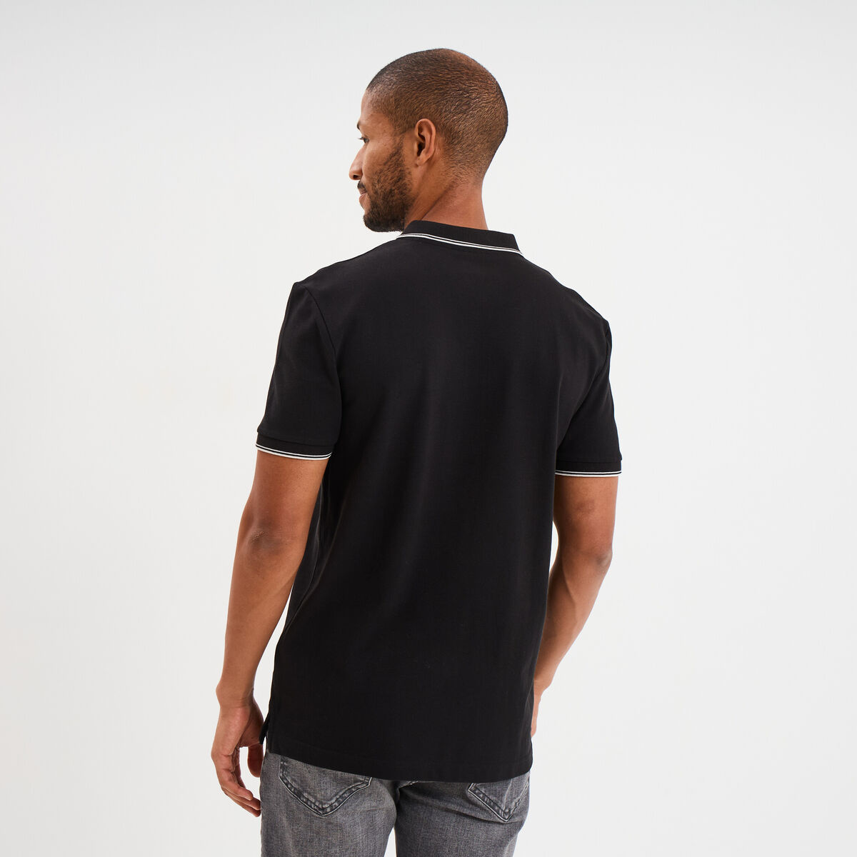 Polo manches courtes bords contrastés noir homme