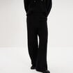 Pantalon large en maille cropped noir femme