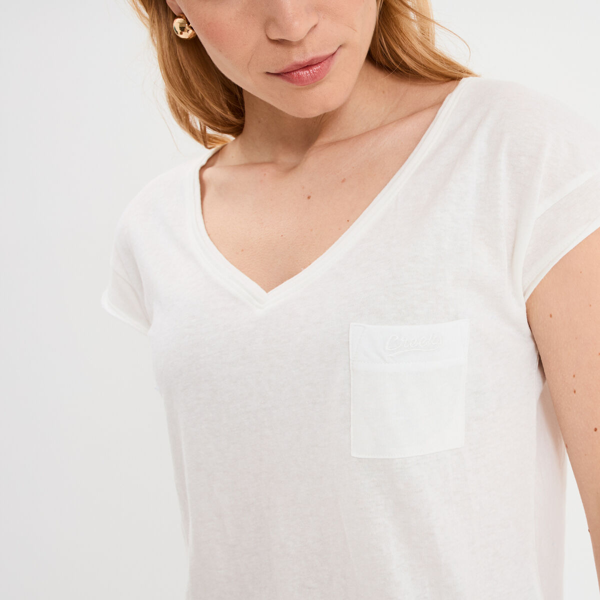 T-shirt col v poche poitrine blanc femme