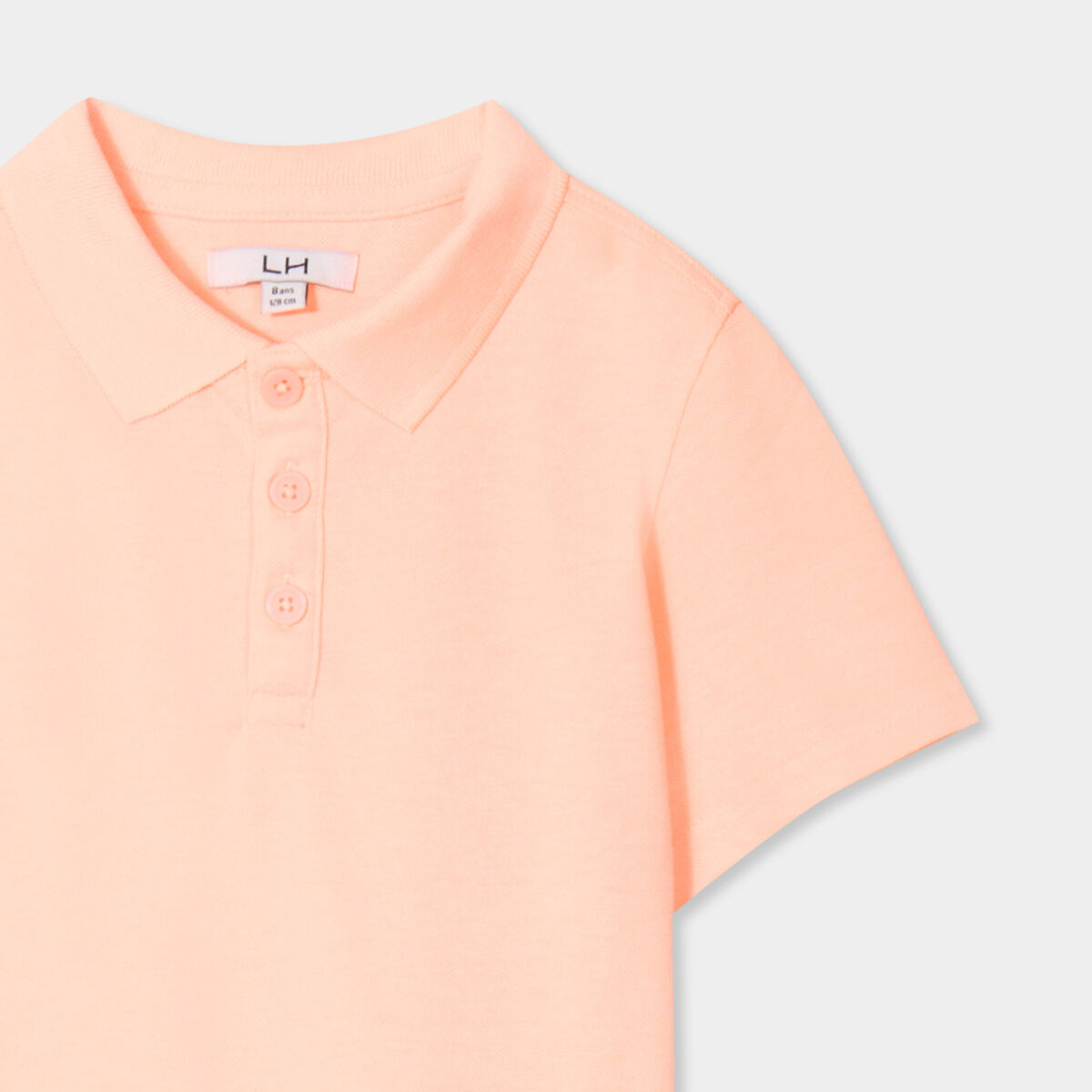 Polo manches courtes &agrave; d&eacute;tail brod&eacute; orange fluo gar&ccedil;on