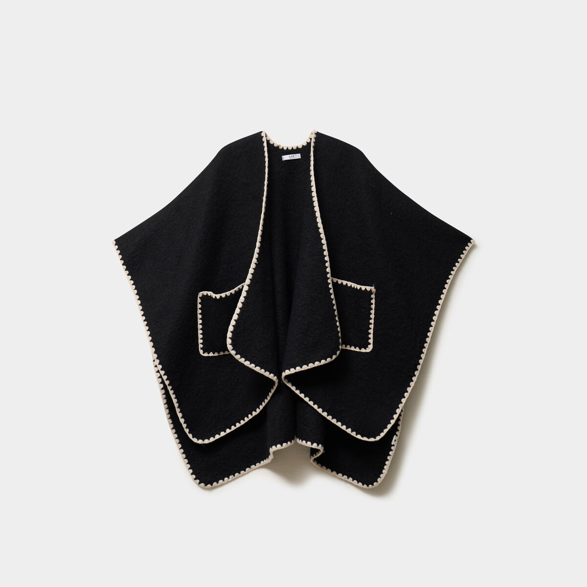 Poncho avec liser&eacute;s contrast&eacute;s noir femme