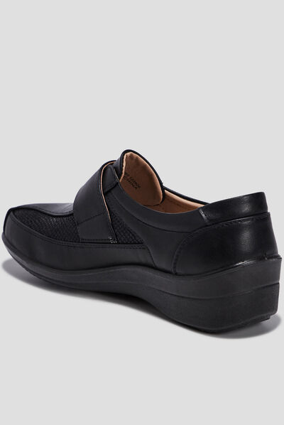 Loafers compensés en cuir noir femme