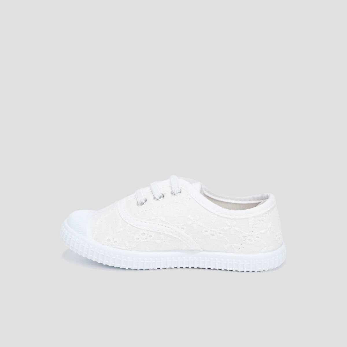 Tennis en toile avec bout renforc&eacute; blanc fille