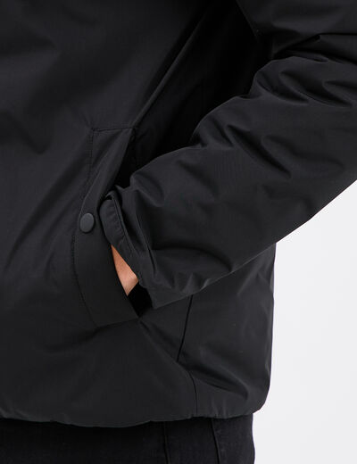Blouson à capuche déperlant noir homme
