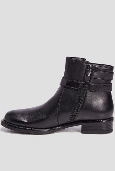 Bottines avec boucles en cuir noir femme