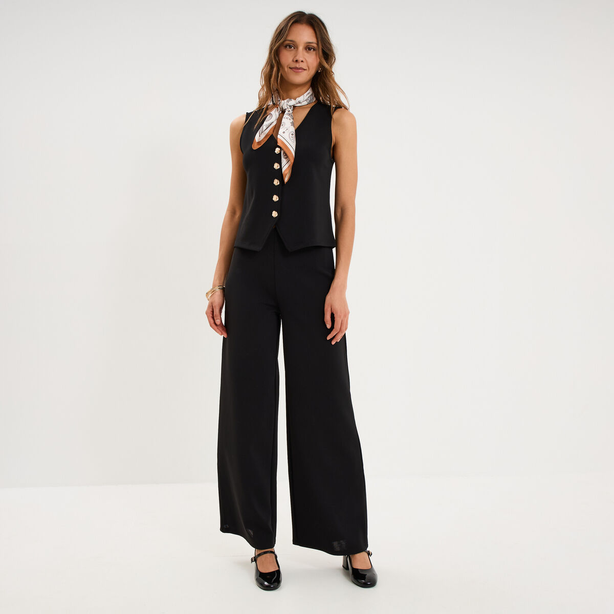 Gilet sans manches ajust&eacute; col en V noir femme