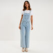 Salopette en jean jambe large coton denim triple stone femme