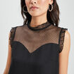 Blouse plumetis habillée sans manches noir femme