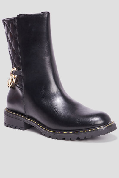 Bottes matelassées avec chaînes noir femme