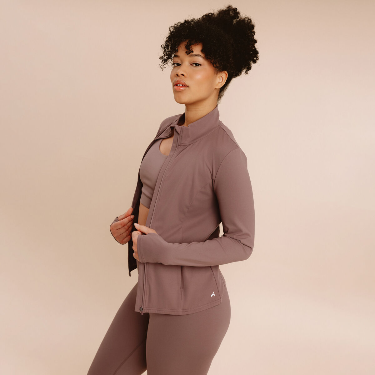 Veste de sport ajust&eacute;e avec fermeture mauve femme