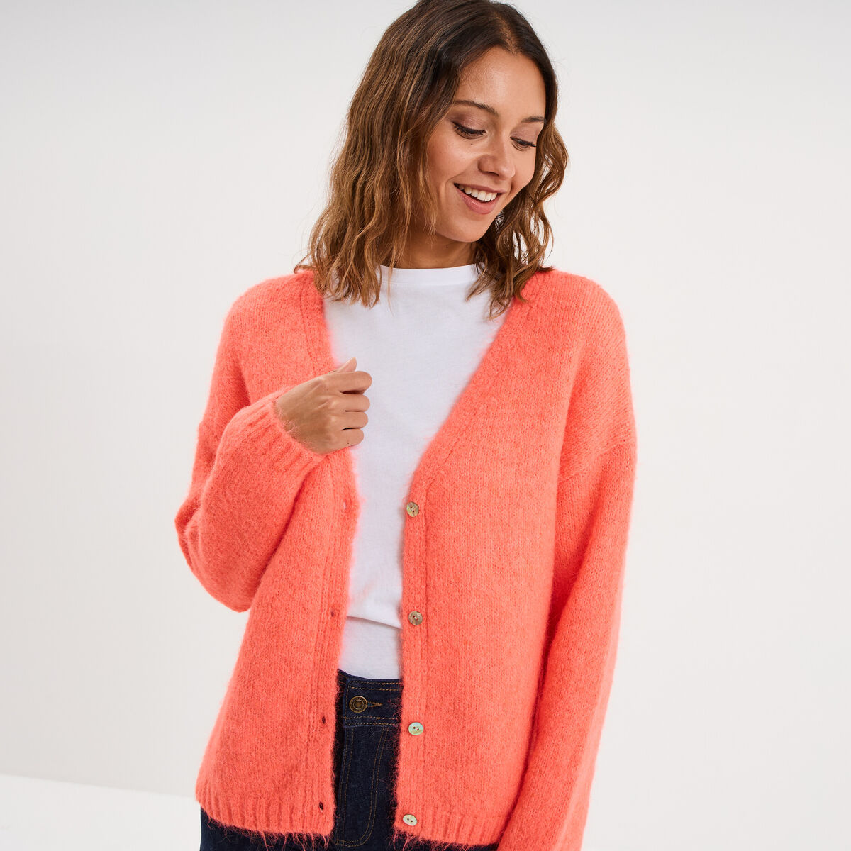 Gilet col en V manches longues rose fluo femme