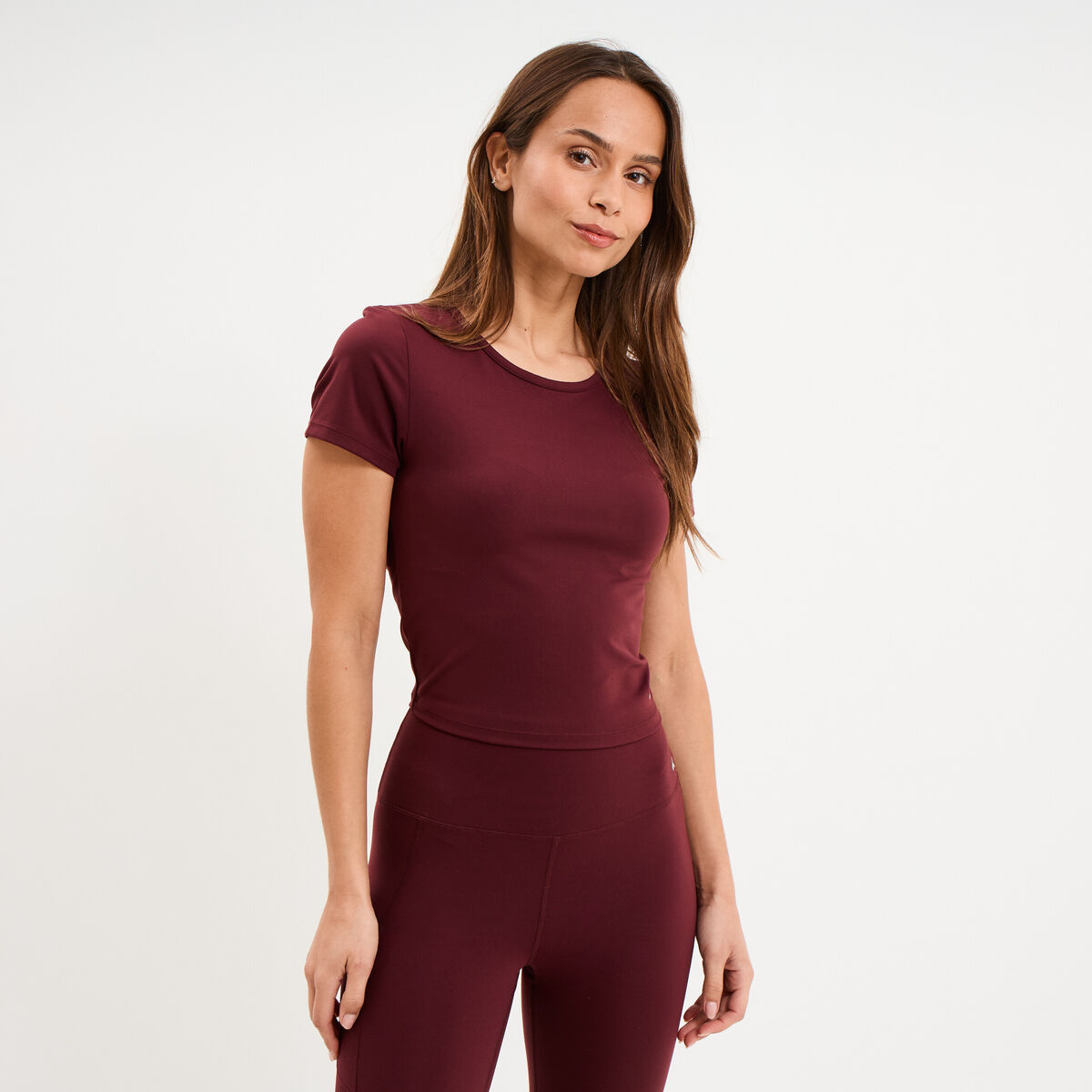 T-shirt de sport court ajust&eacute; violet fonc&eacute; femme