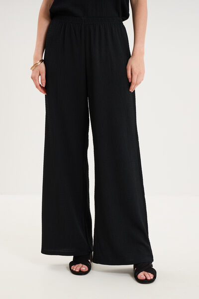 Pantalon effet gaufr&eacute; fluide noir femme
