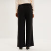 Pantalon &agrave; ponts flare effet cr&ecirc;pe noir femme