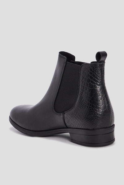 Bottines chelsea plates en cuir noir femme