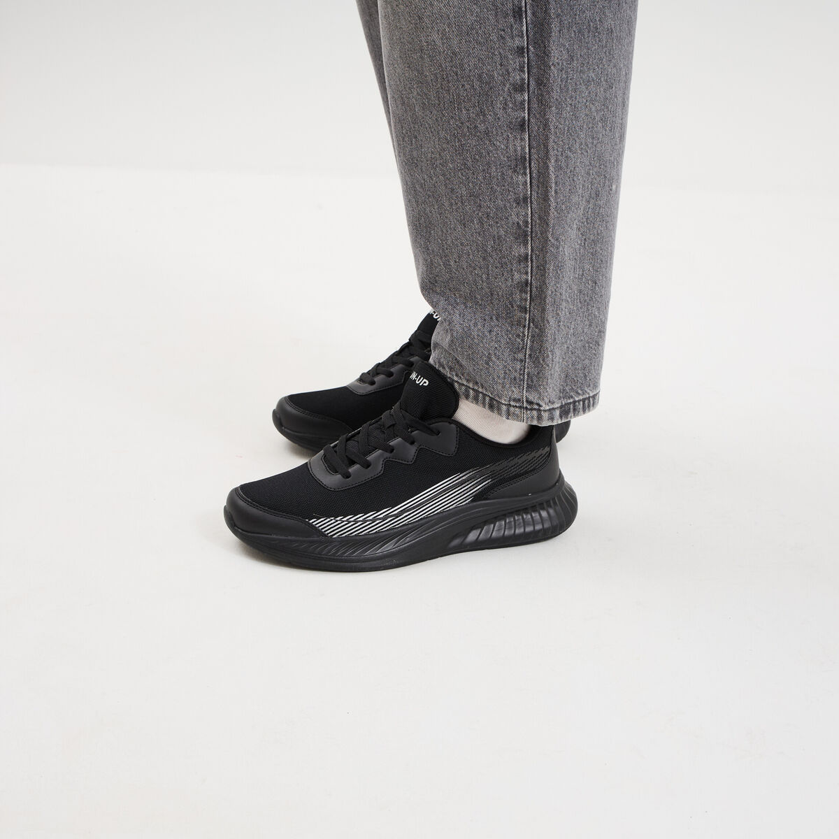 Baskets running noir homme