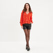 Short simili cuir large à pont noir femme
