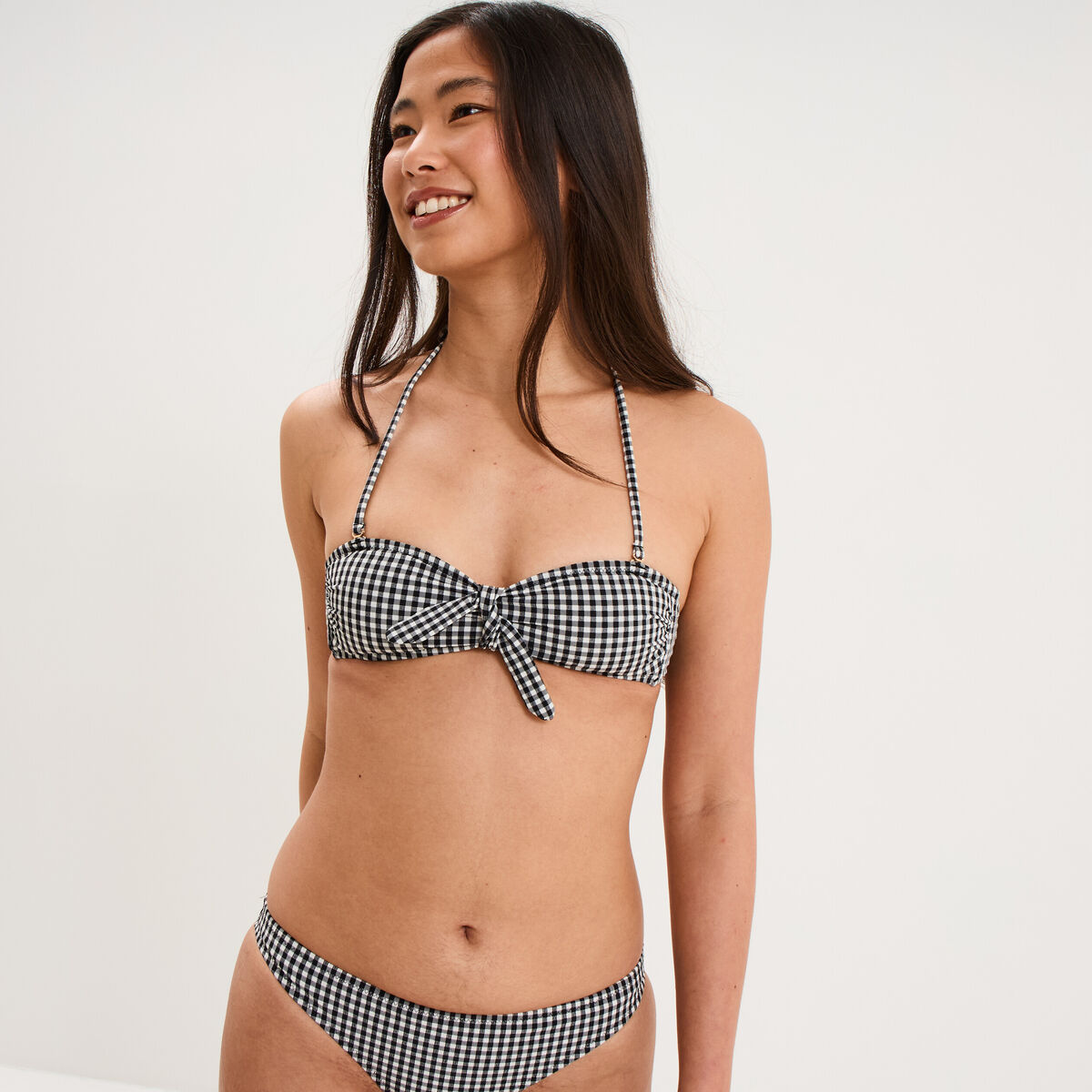Haut de maillot de bain bandeau noeud noir femme