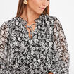Blouse manches longues col montant noir femme