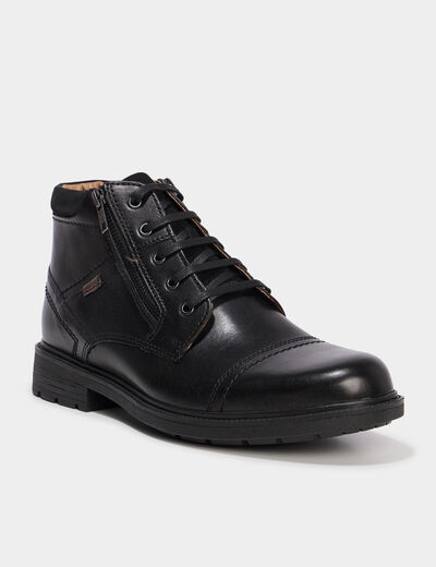 Bottines montantes zipp&eacute;es en cuir noir homme