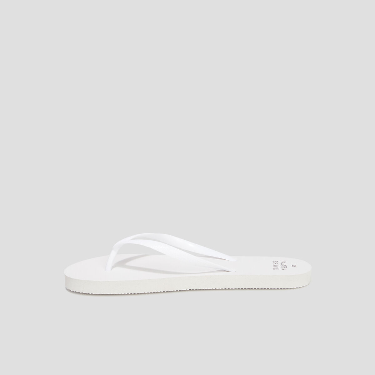Tongs semelle plate blanc femme