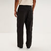 Pantalon cargo large avec poches c&ocirc;t&eacute;s noir homme