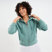 Sweat zippé à capuche court bleu gris femme