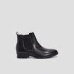 Bottines chelsea plates en cuir noir femme