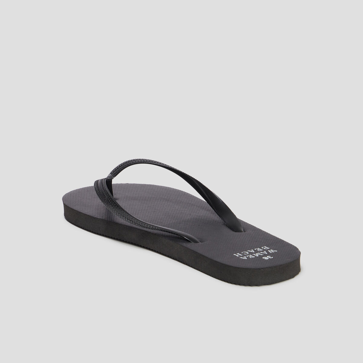 Tongs semelle plate noir femme