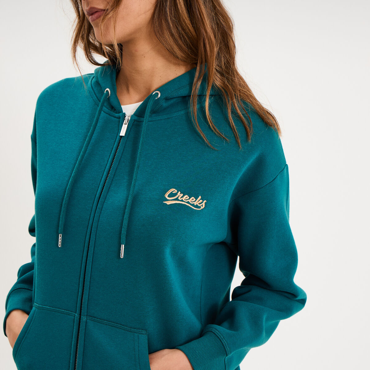 Sweat zipp&eacute; &agrave; capuche vert fonc&eacute; femme