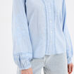 Blouse manches ballons brodées bleu ciel femme