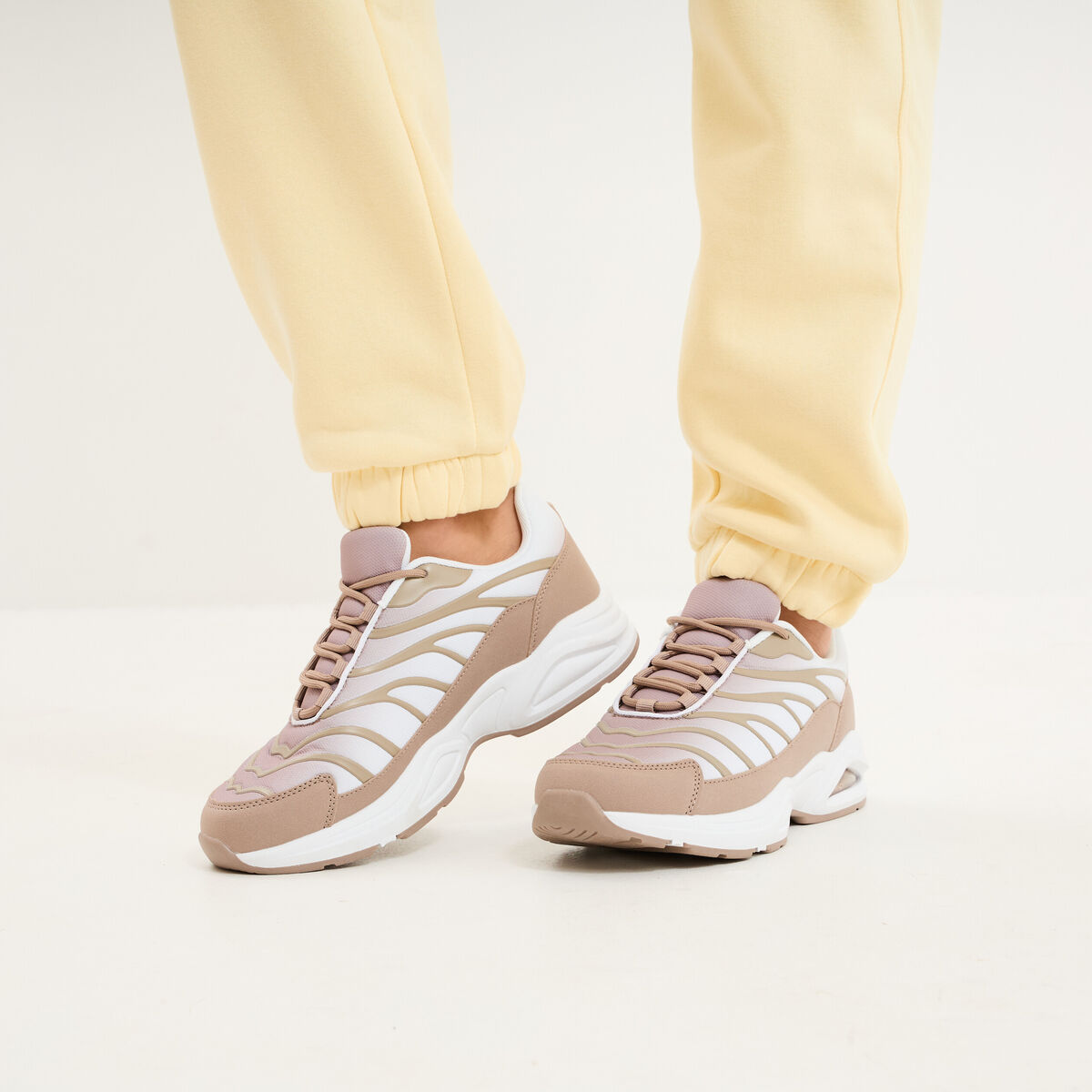 Baskets running semelles bulles taupe femme