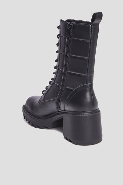 Bottes à talons crantées noir femme