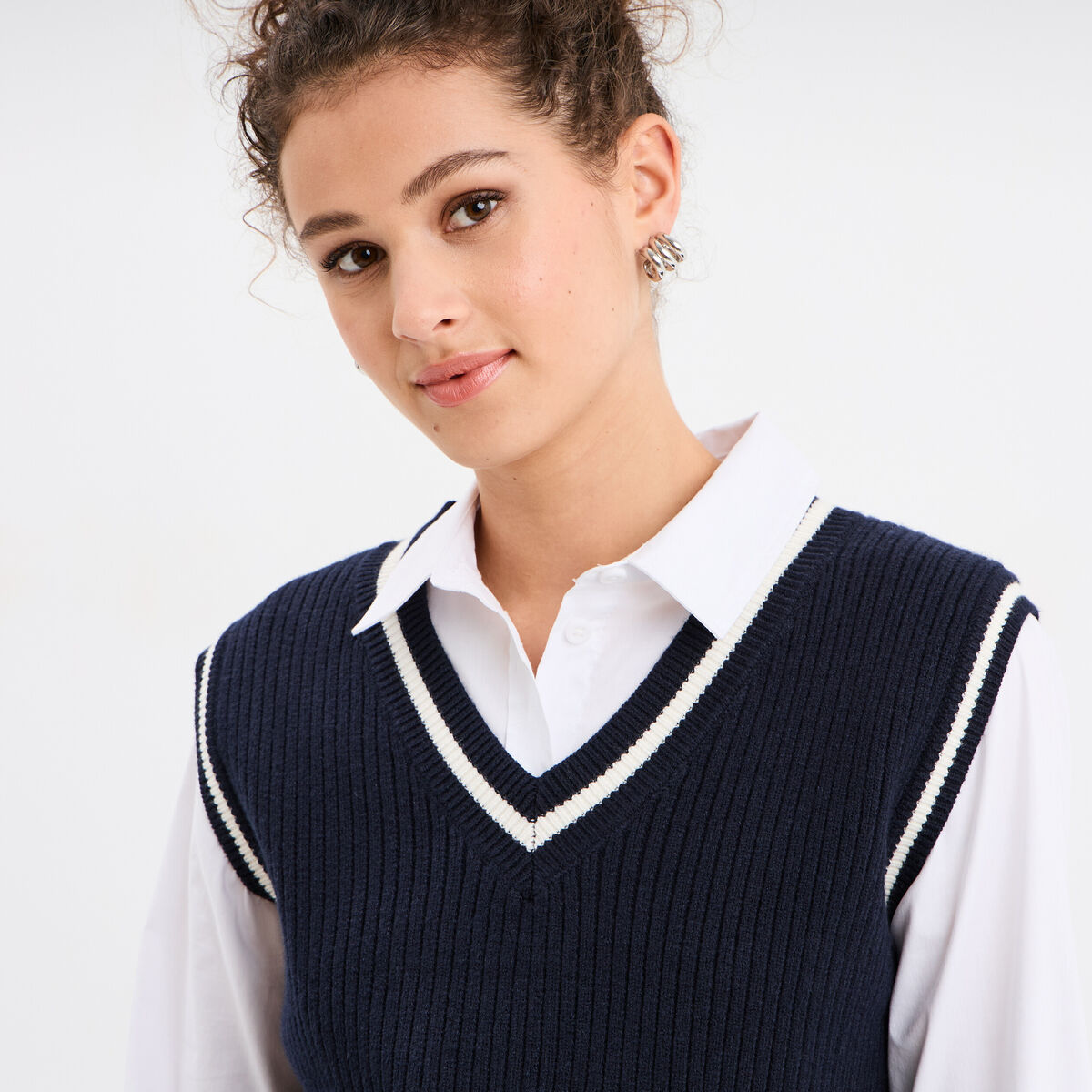 Pull sans manches col en V bleu marine femme