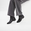 Bottines à talons plats détails cloutés noir femme