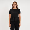 T-shirt gaufr&eacute; taille &agrave; volants noir femme