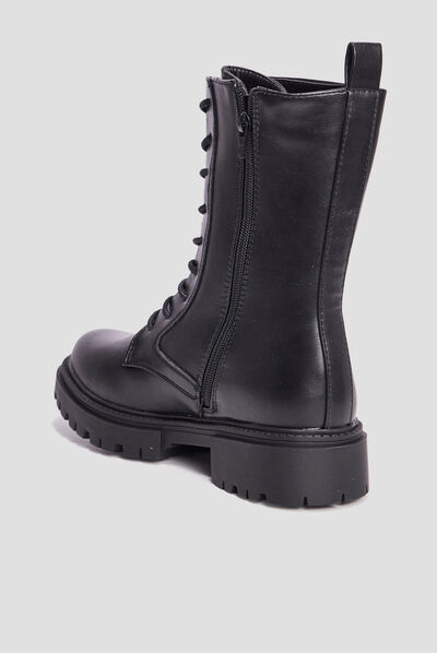 Boots à lacets zippées crantées noir femme