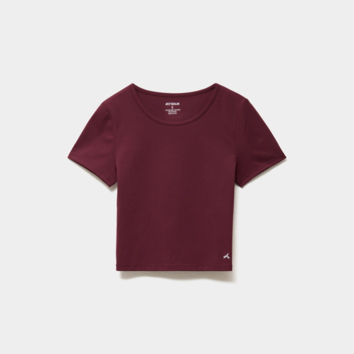 T-shirt de sport court ajust&eacute; violet fonc&eacute; femme