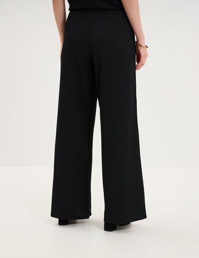 Pantalon effet gaufr&eacute; fluide noir femme
