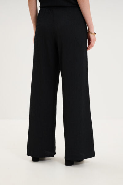 Pantalon effet gaufr&eacute; fluide noir femme