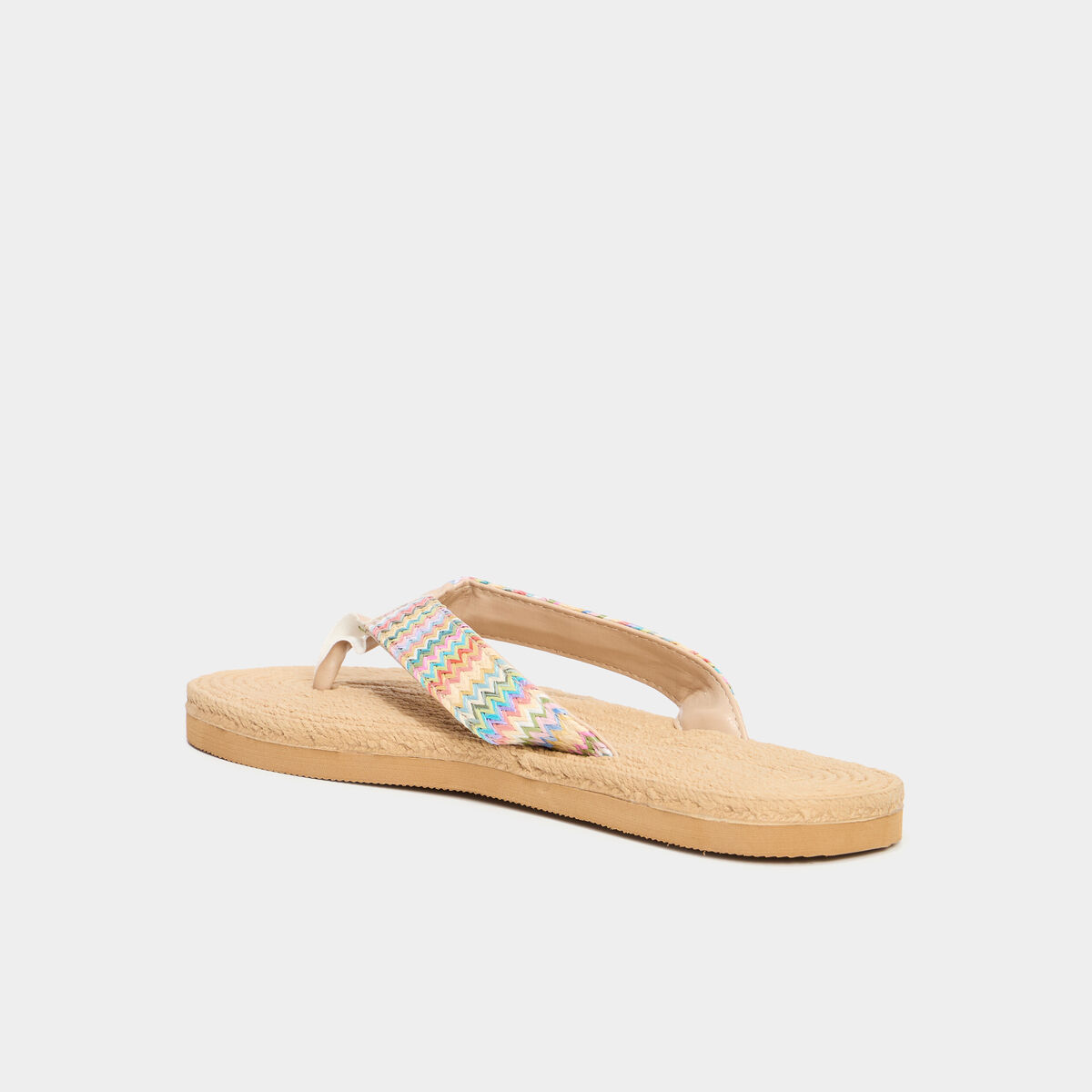 Tongs de plage détails tressés sable femme