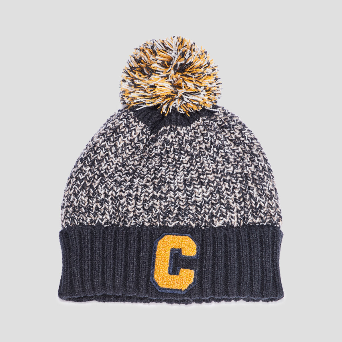 Bonnet tricot&eacute; avec pompon sur le haut jaune moutarde gar&ccedil;on