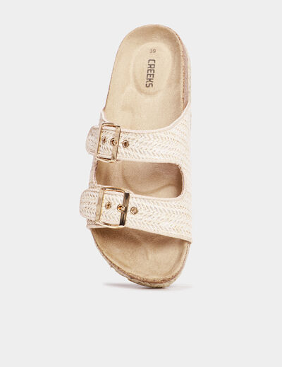 Mules plates tress&eacute;es avec boucles sable femme