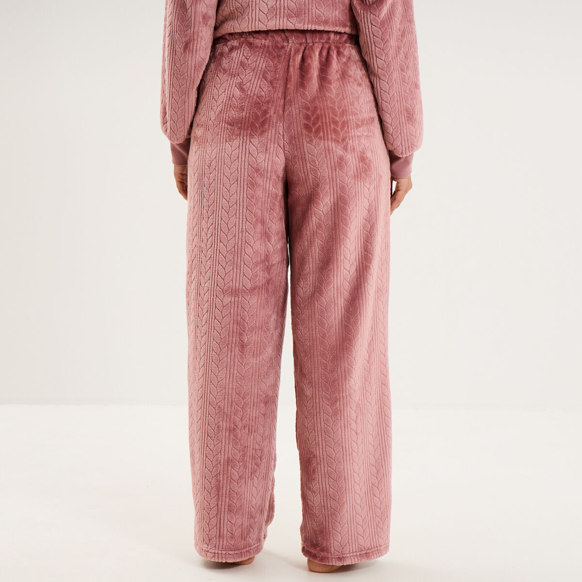 Pantalon effet polaire d&eacute;tails torsades rose framboise femme