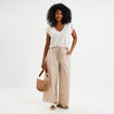 Pantalon avec broderie anglaise beige femme